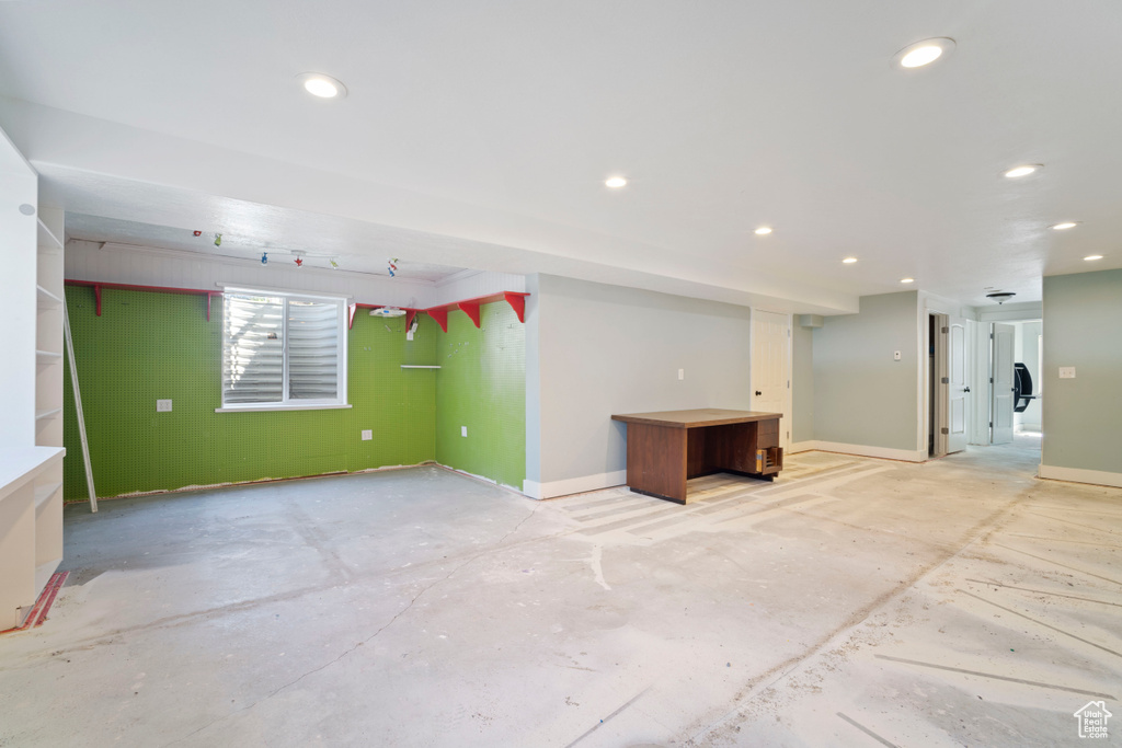 Below grade area with recessed lighting and baseboards