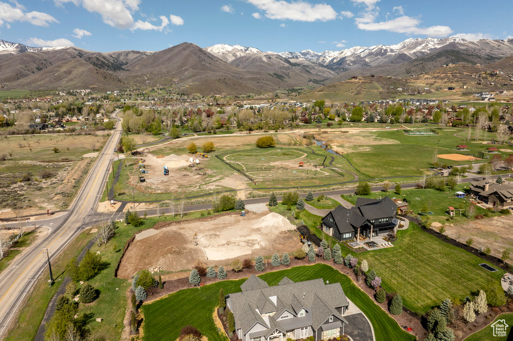 Drone / aerial view with a mountain view and a residential view