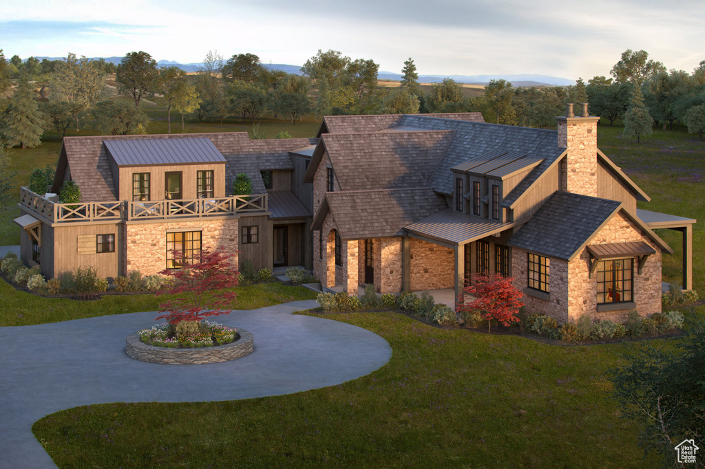 View of front of house with a standing seam roof, a chimney, metal roof, a front lawn, and stone siding