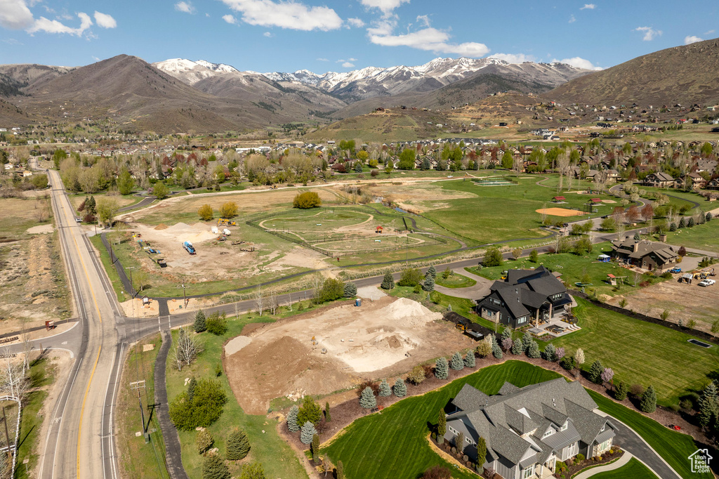 Drone / aerial view with a residential view and a mountain view