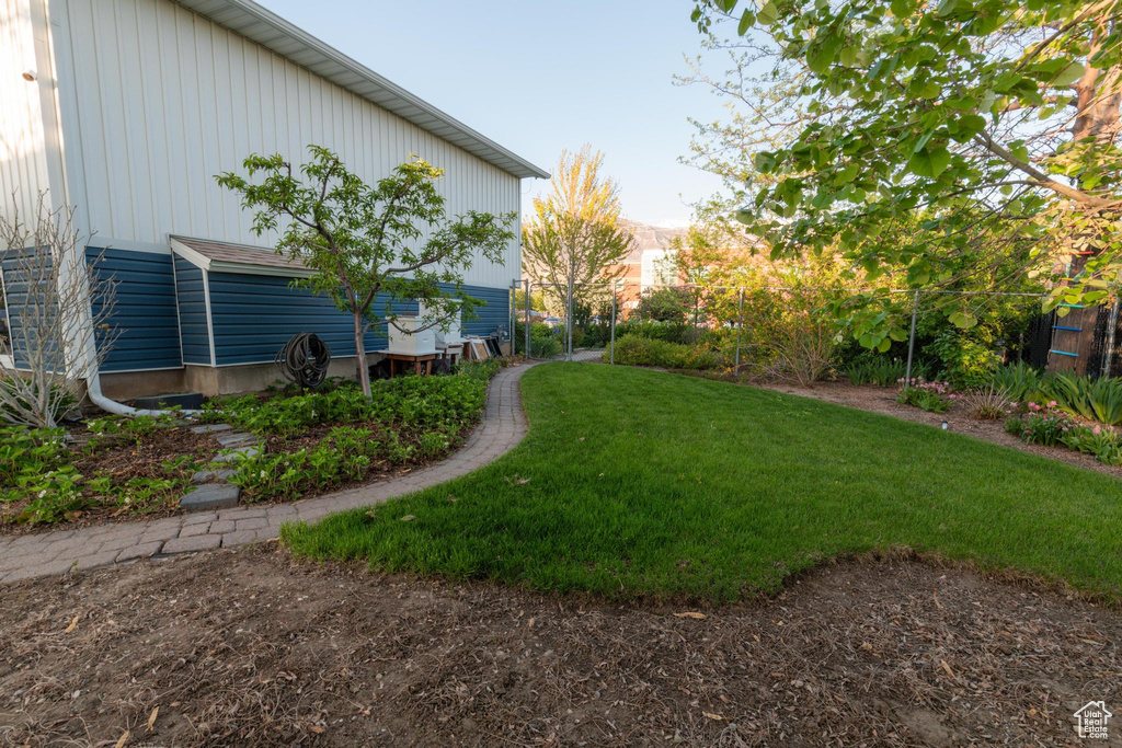 View of yard with fence