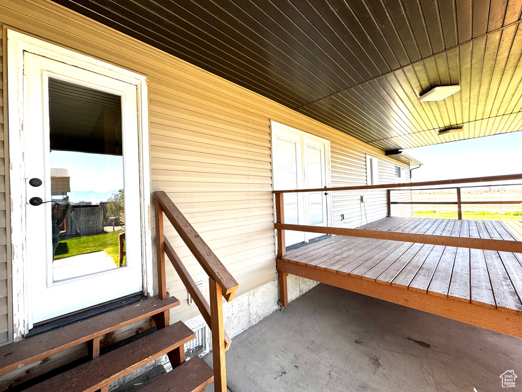Exterior space with a wooden deck