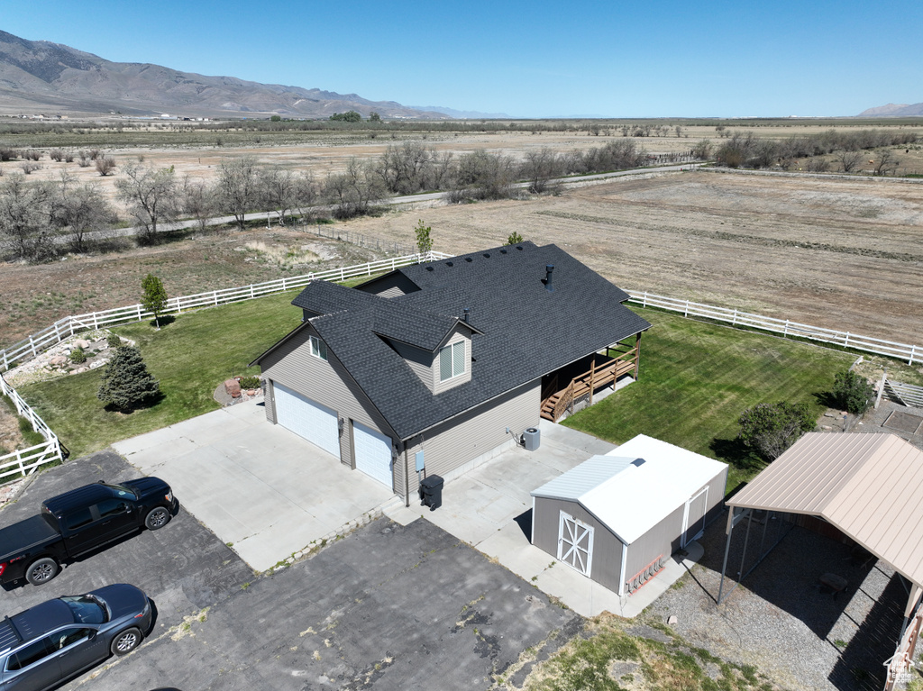 Drone / aerial view featuring a mountain view and a rural view