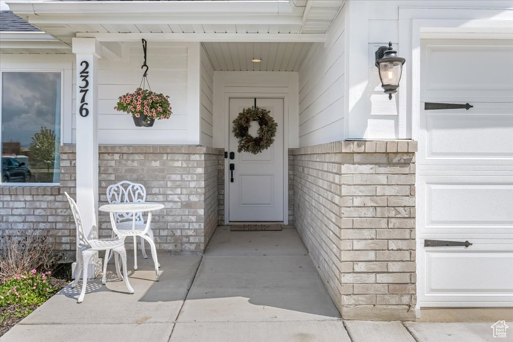 Entrance to property with covered porch