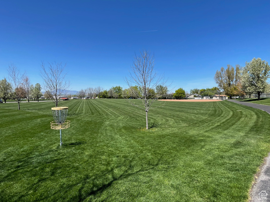 View of property\\\'s community with a yard