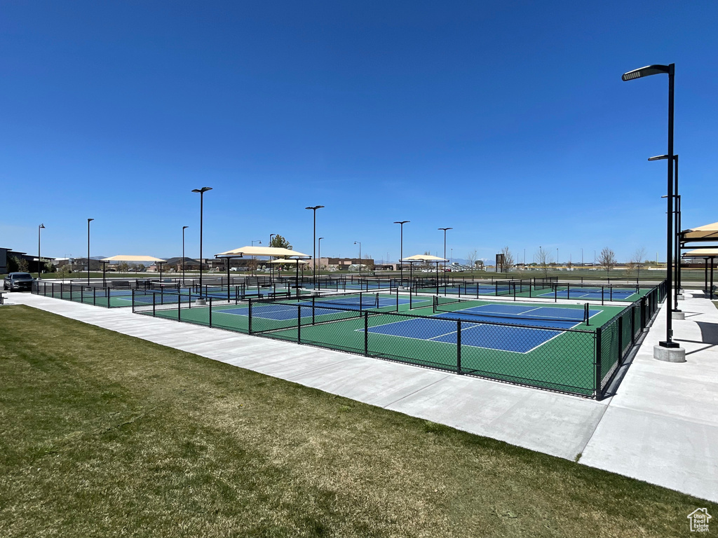 View of tennis court with fence