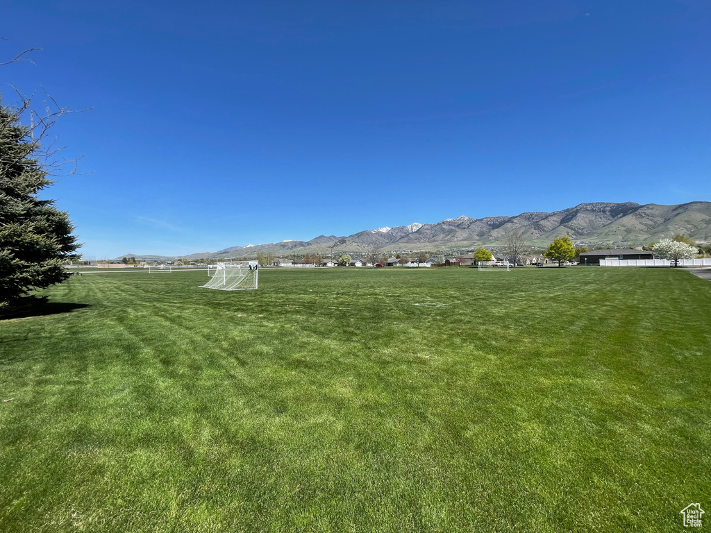 View of yard with a mountain view and a rural view