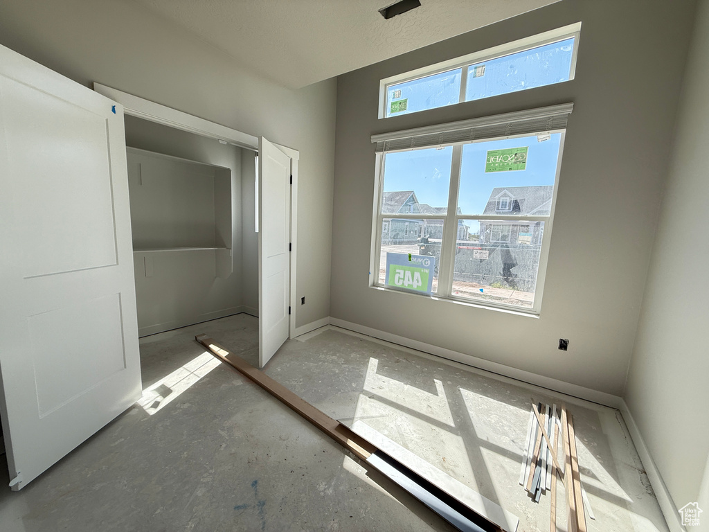Unfurnished bedroom with a closet