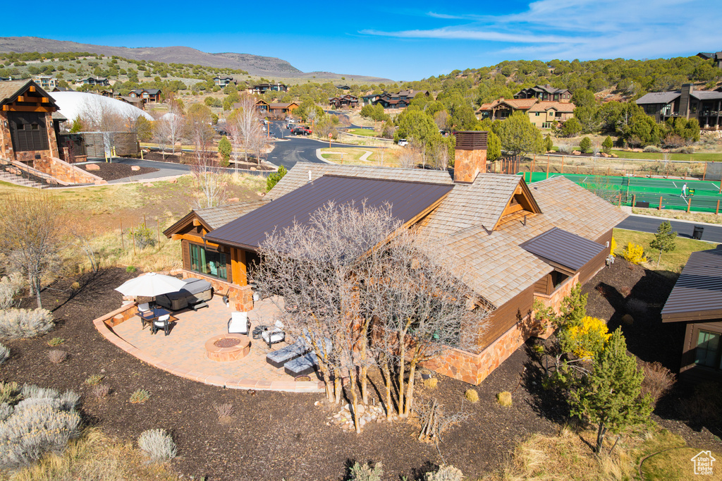Drone / aerial view featuring a residential view and a mountain view