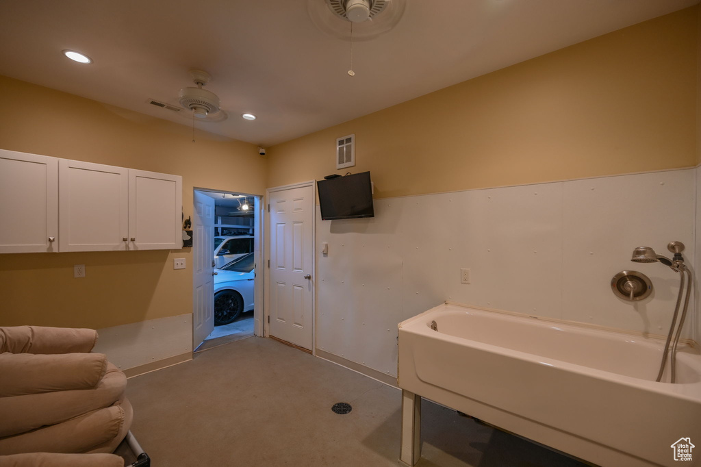 Bathroom featuring a ceiling fan, recessed lighting, and visible vents
