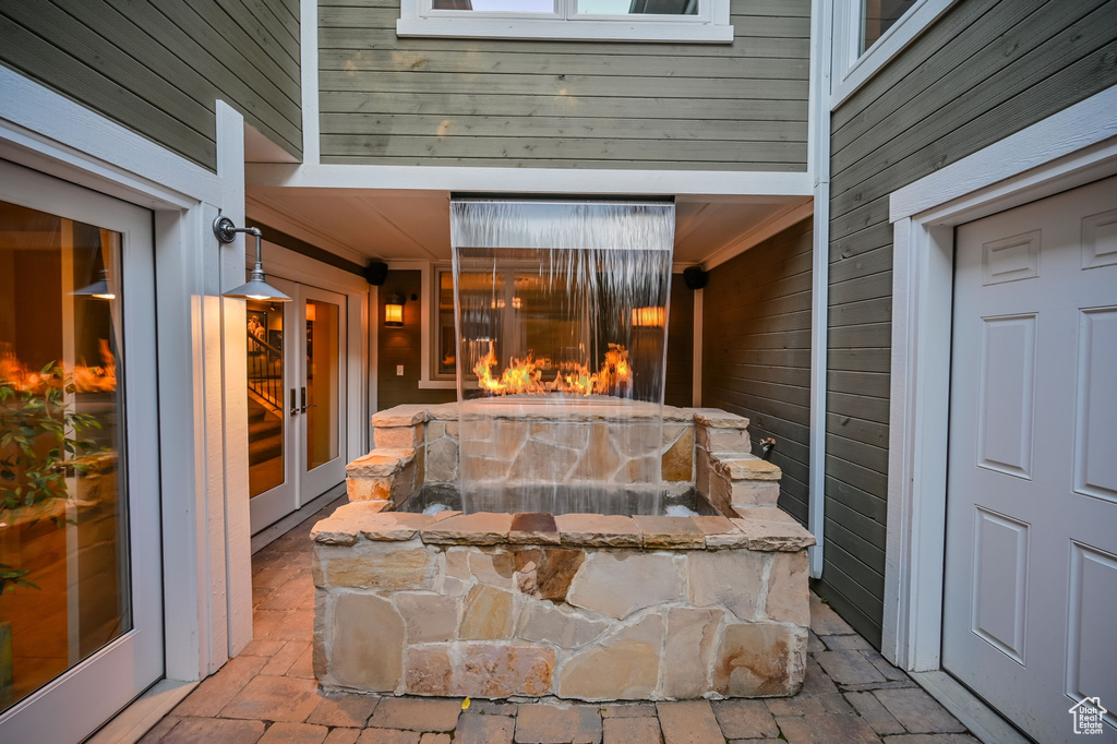 View of patio / terrace featuring a fireplace