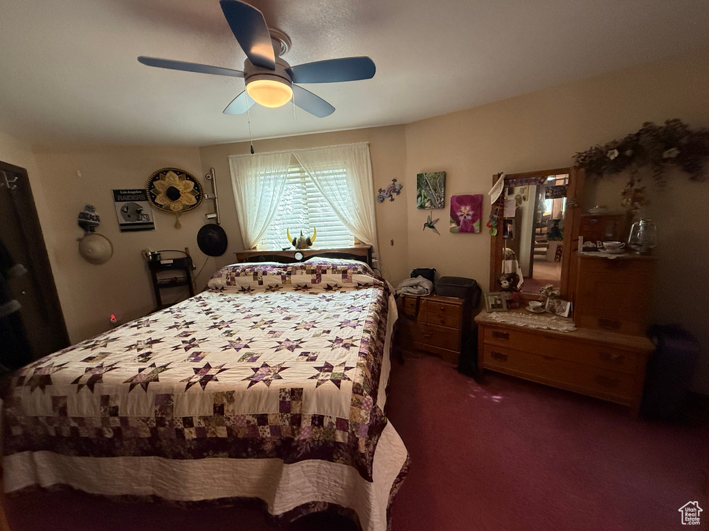 Bedroom featuring carpet flooring and a ceiling fan