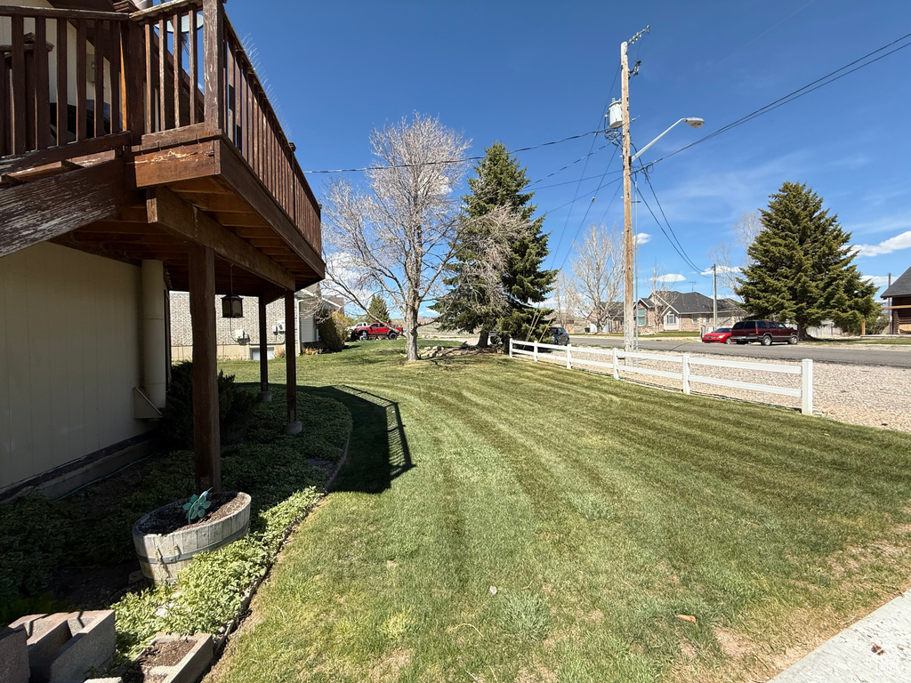 View of yard with a deck