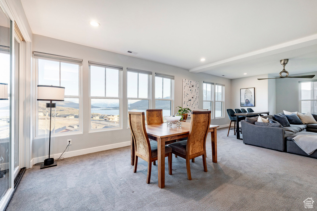 Dining area featuring light colored carpet, recessed lighting, baseboards, and visible vents