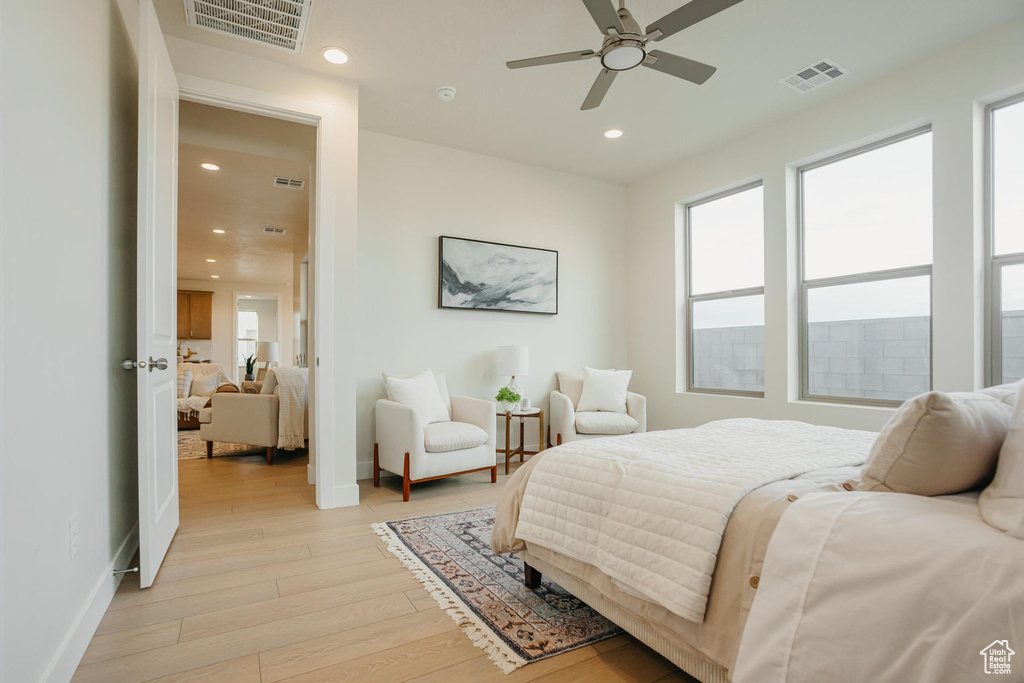 Bedroom with visible vents, recessed lighting, baseboards, and light wood-type flooring