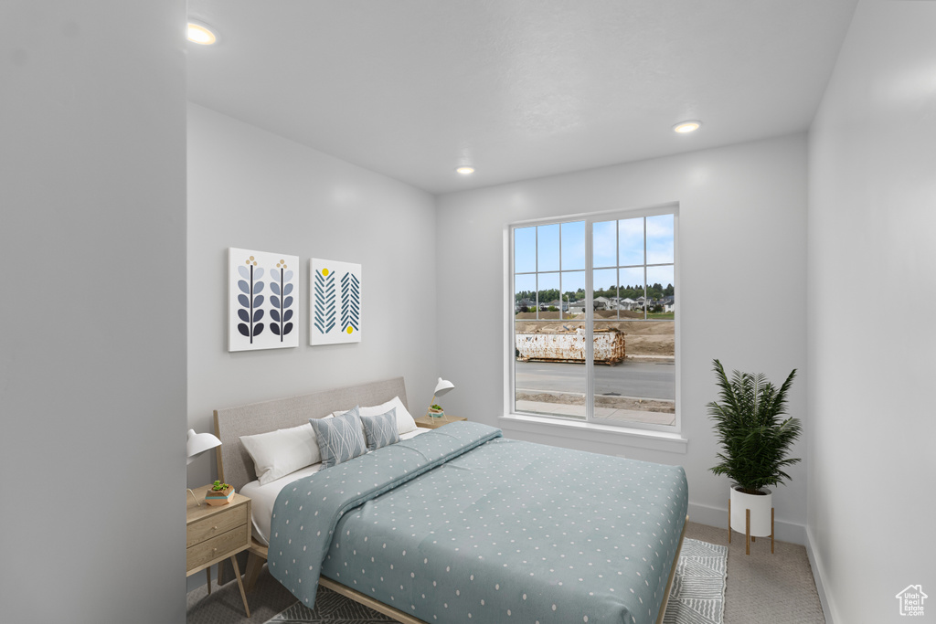 Bedroom with recessed lighting, carpet flooring, and baseboards