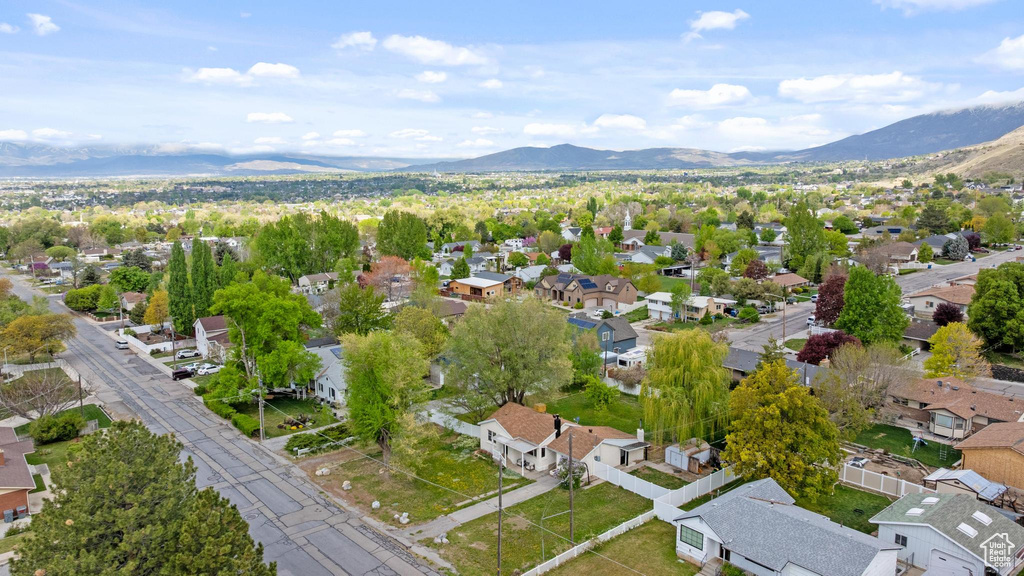 Birds eye view of property featuring a mountain view and a residential view