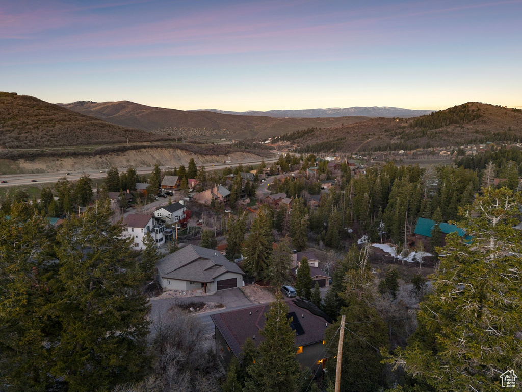 Aerial view at dusk featuring a mountain view