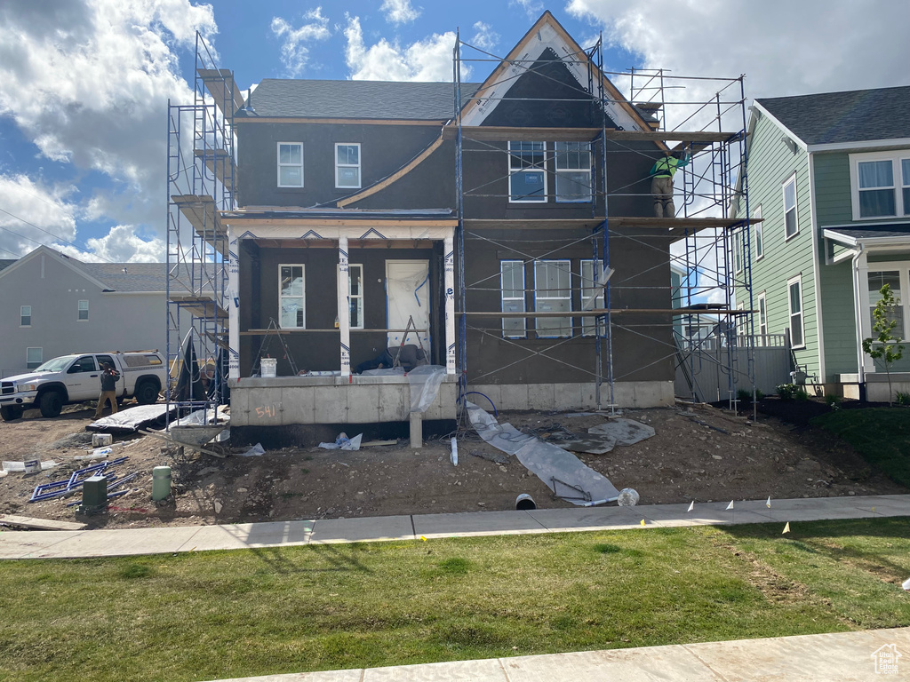View of front of house featuring stucco siding