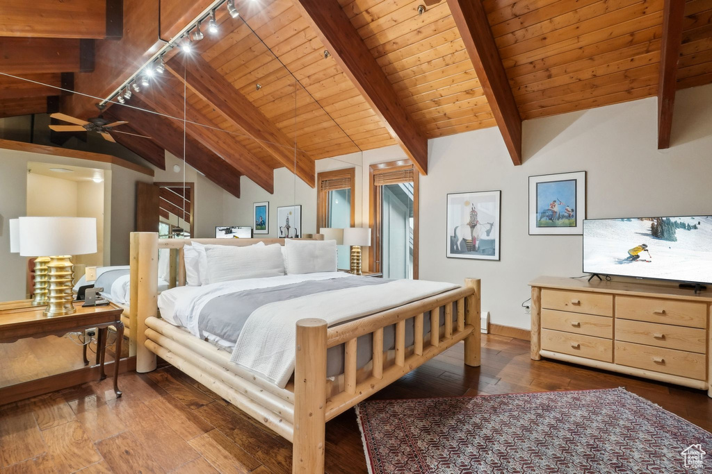 Bedroom with wood-type flooring, wooden ceiling, and lofted ceiling with beams