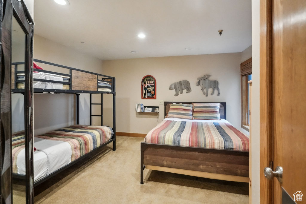 Bedroom with recessed lighting, carpet flooring, and baseboards