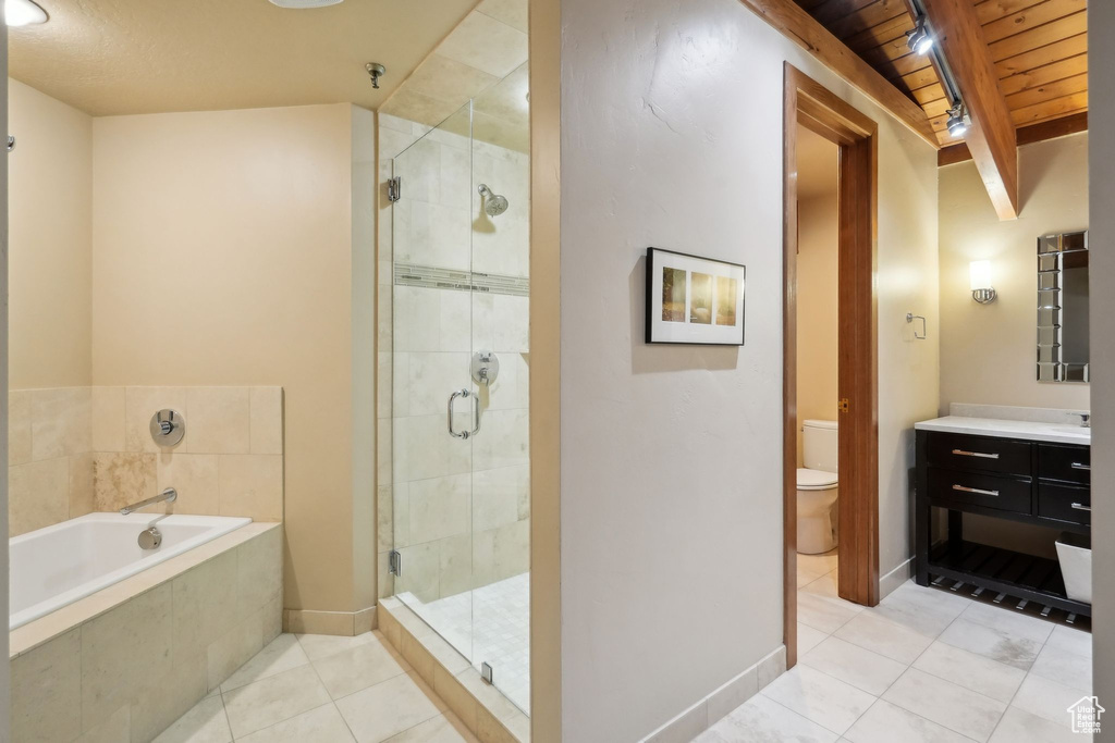 Full bath with a garden tub, vanity, wooden ceiling, a stall shower, and tile patterned floors