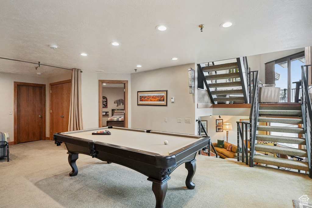 Recreation room featuring light carpet, recessed lighting, and billiards