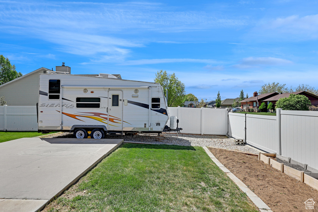 Exterior space featuring fence private yard and a residential view