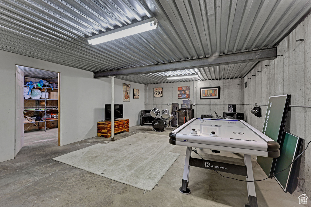 Playroom featuring concrete floors