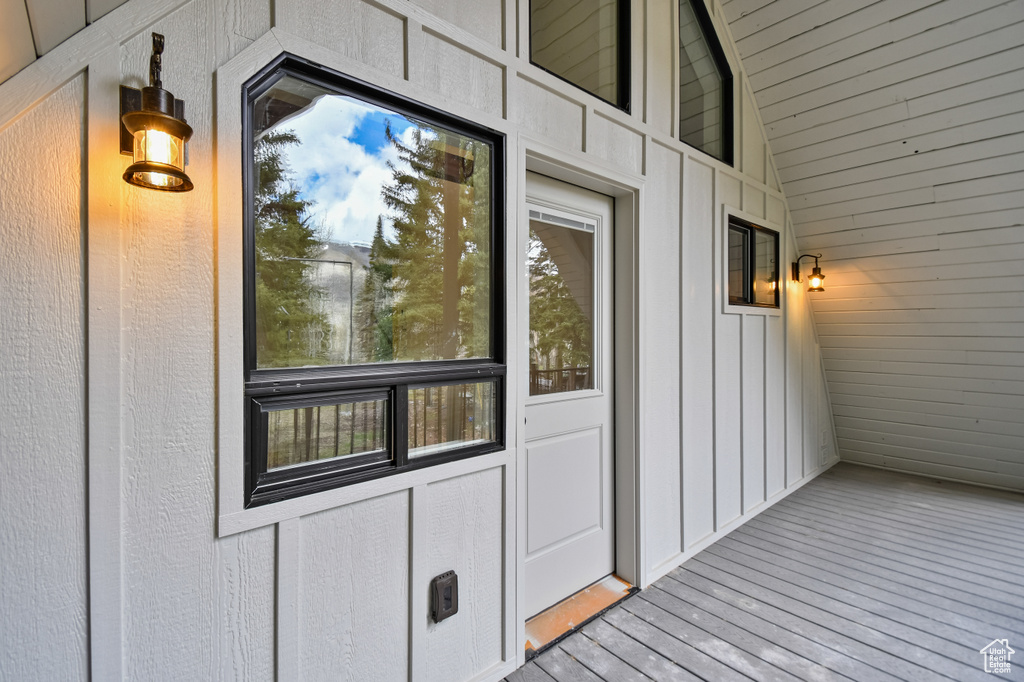 Entrance to property featuring board and batten siding