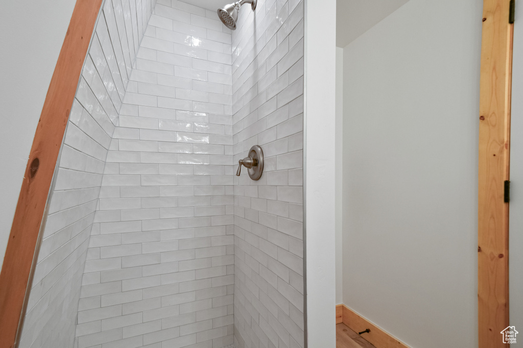 Bathroom with tiled shower