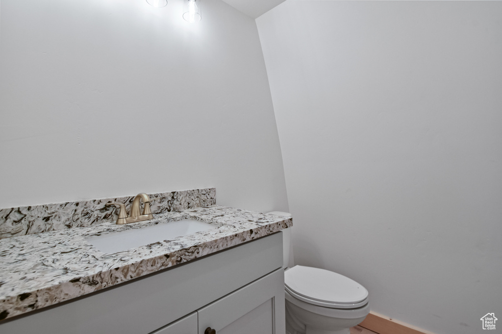 Bathroom featuring toilet and vanity