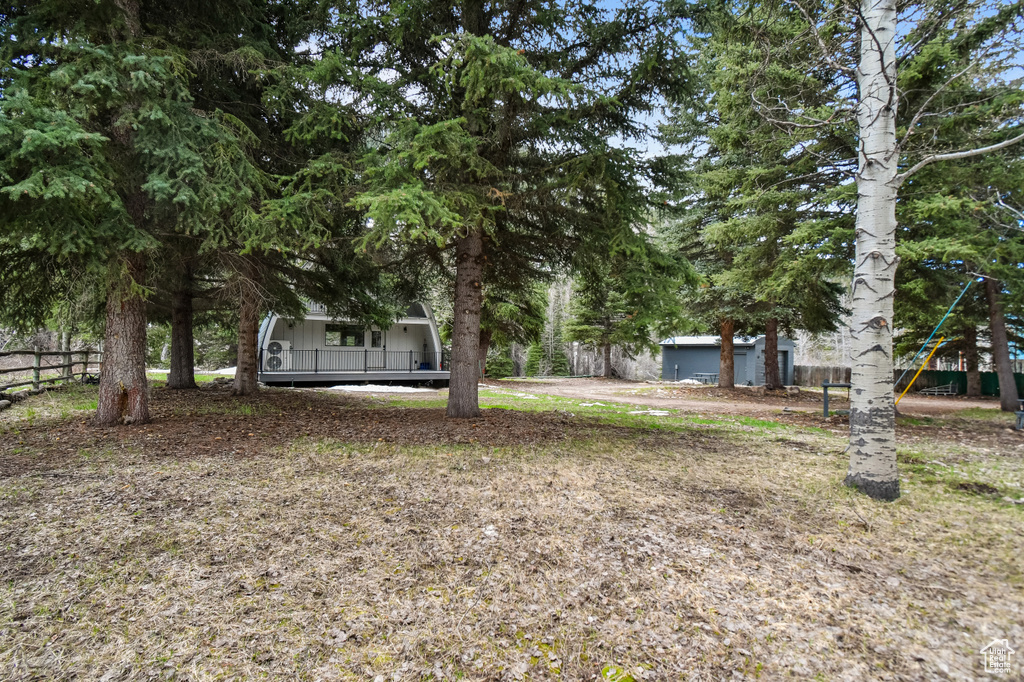 View of yard with fence