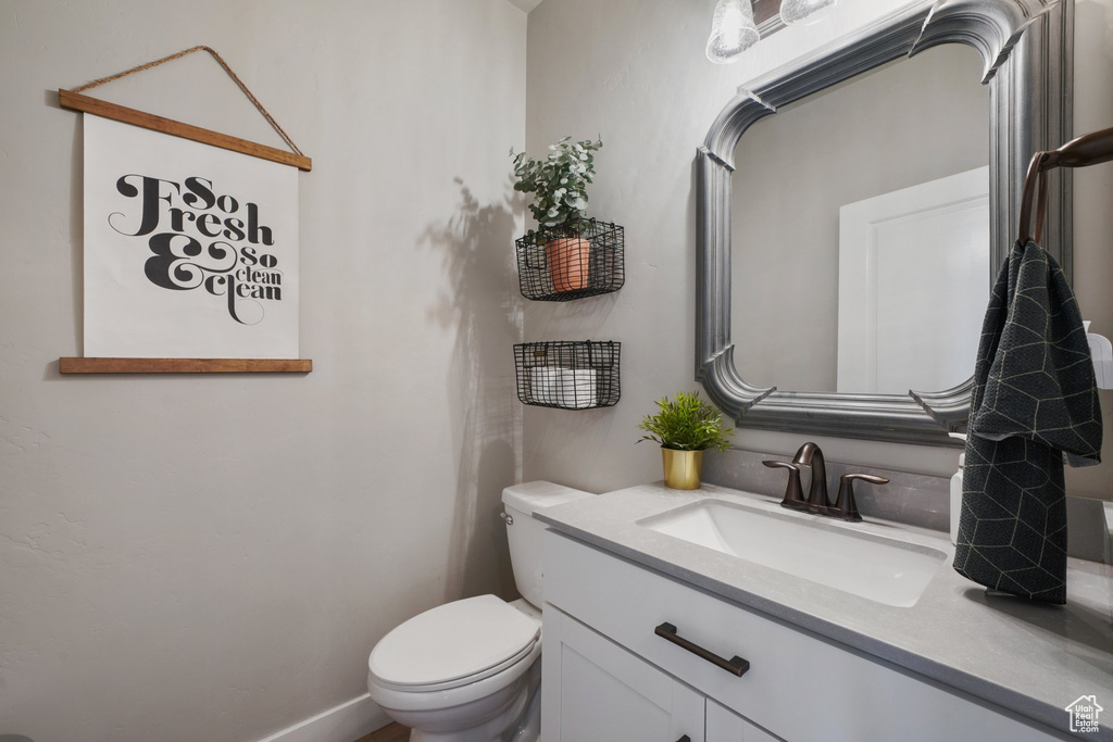 Bathroom with vanity and toilet