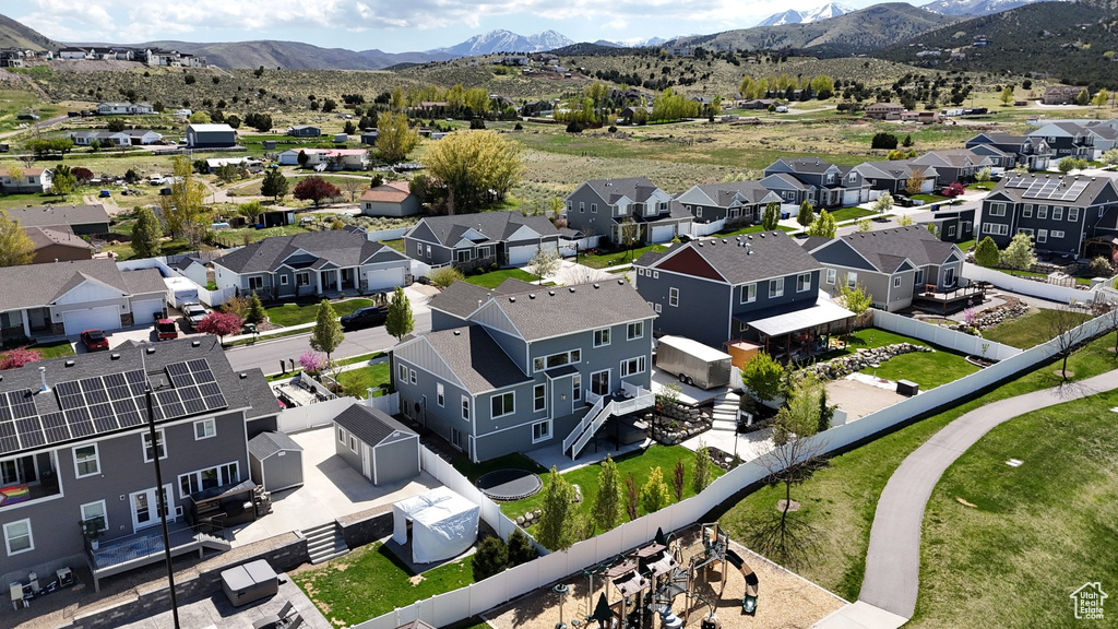 Drone / aerial view featuring a residential view and a mountain view