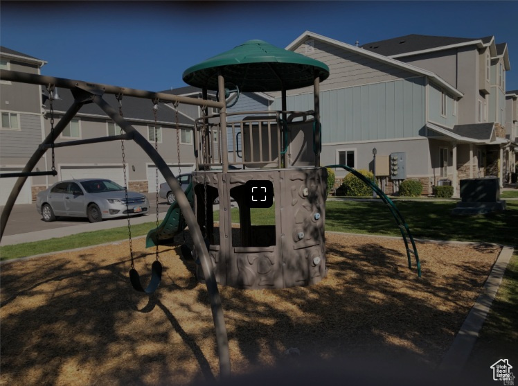 Communal playground with a residential view
