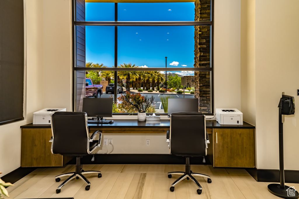 Office area featuring built in study area