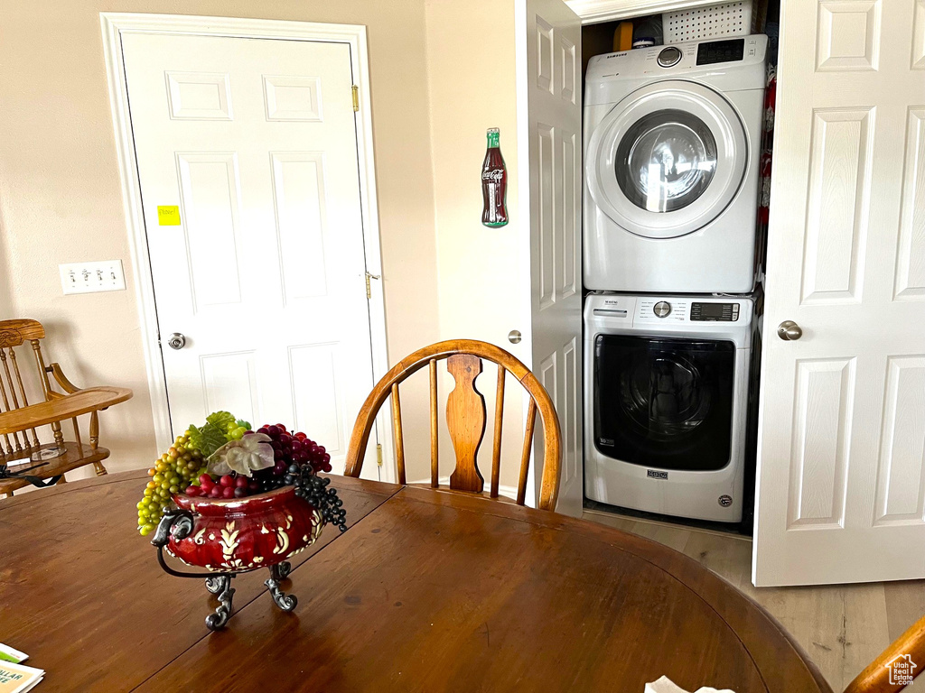 Dining area with stacked washer and dryer