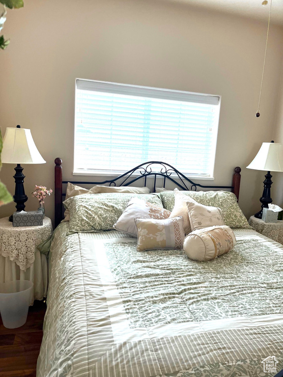 Bedroom featuring wood finished floors