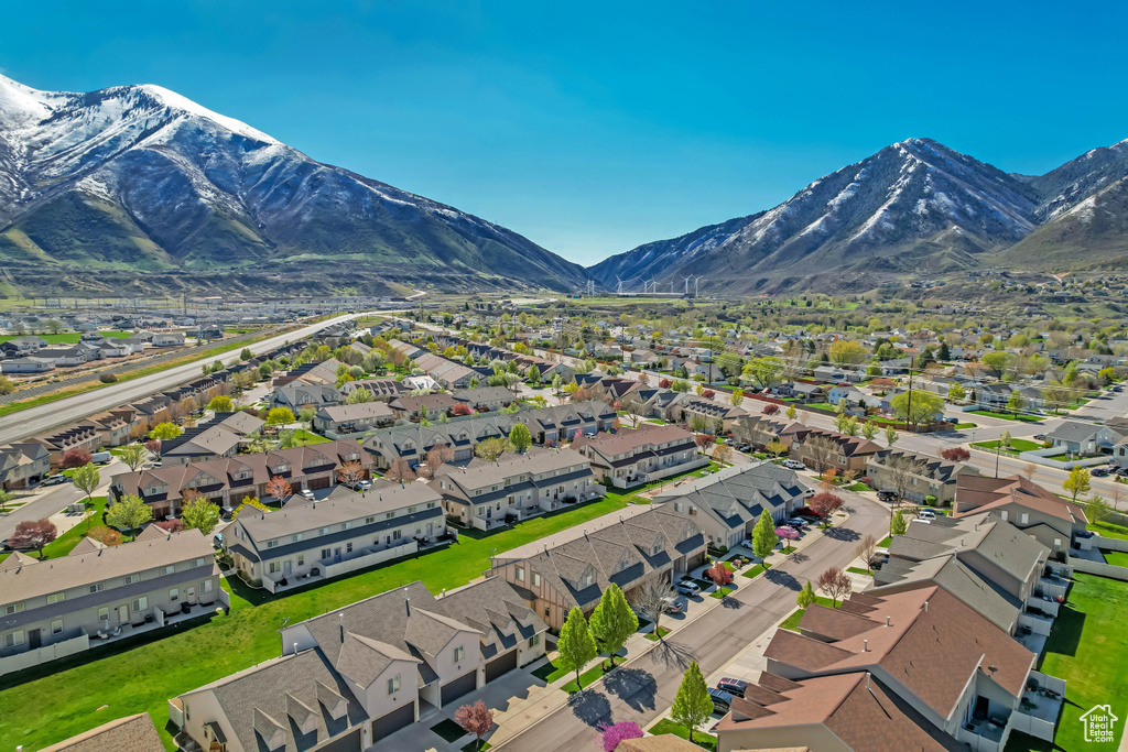 Birds eye view of property featuring a mountain view and a residential view