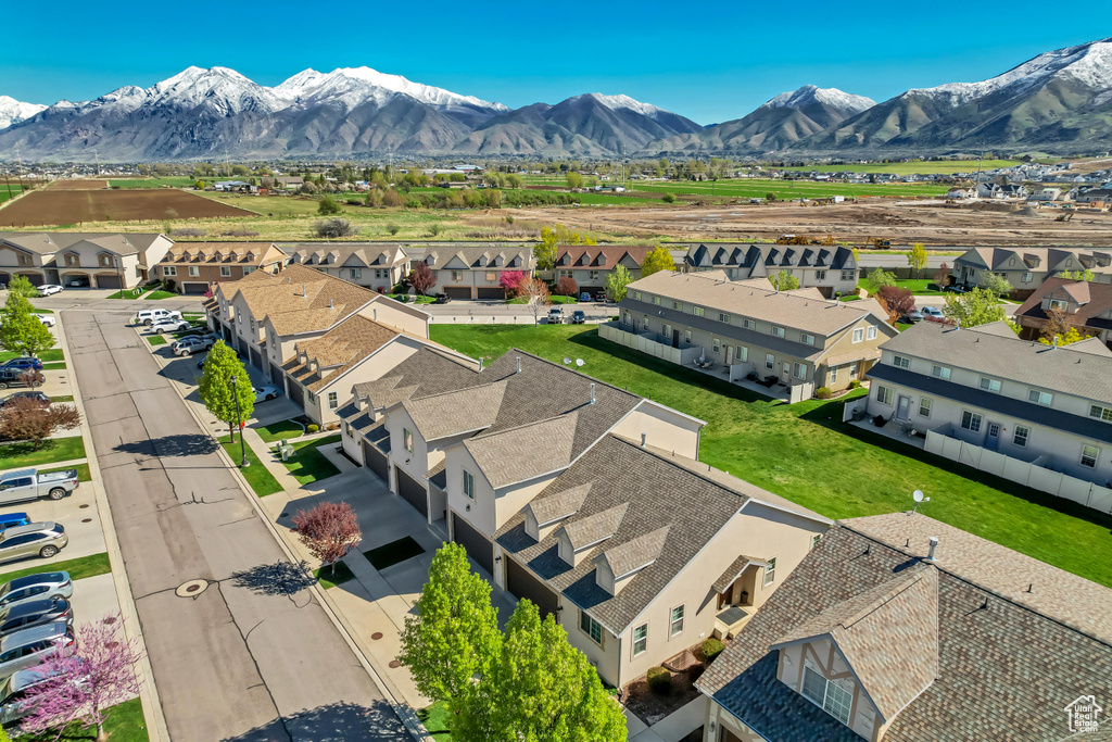 Drone / aerial view featuring a residential view and a mountain view