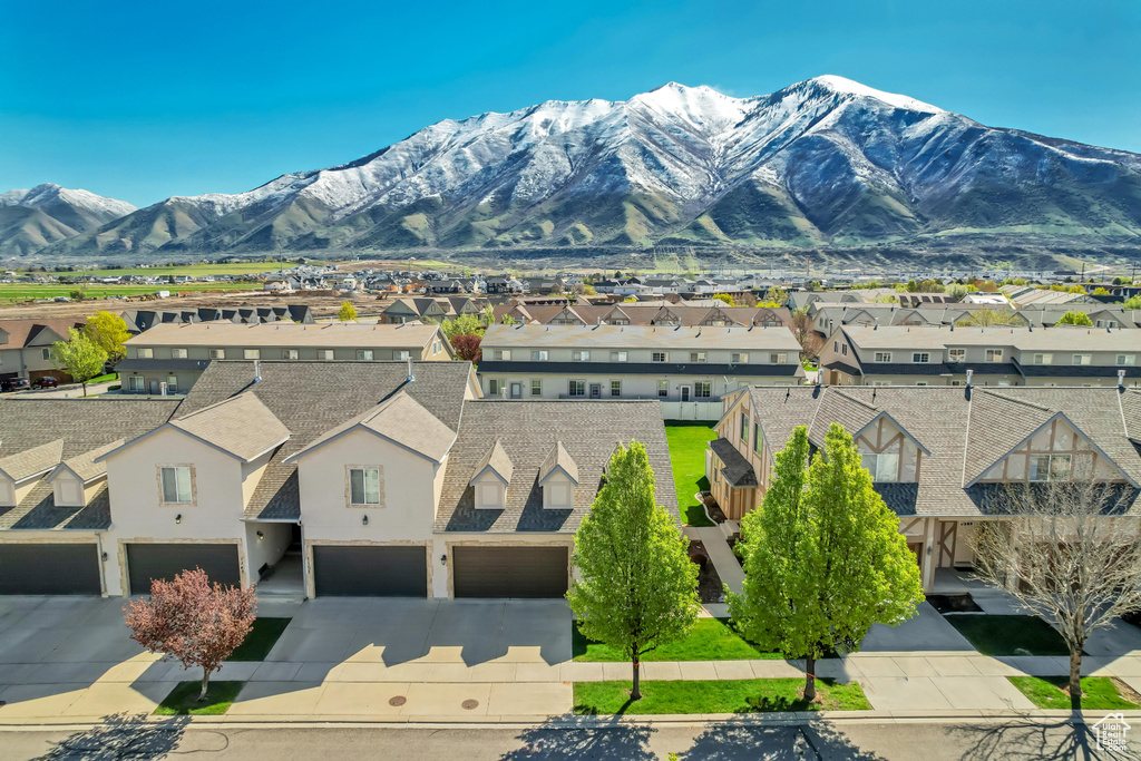 Property view of mountains featuring a residential view
