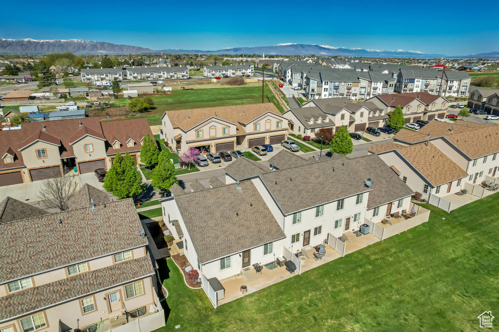 Aerial view featuring a mountain view and a residential view