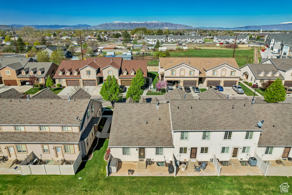 Drone / aerial view with a mountain view and a residential view