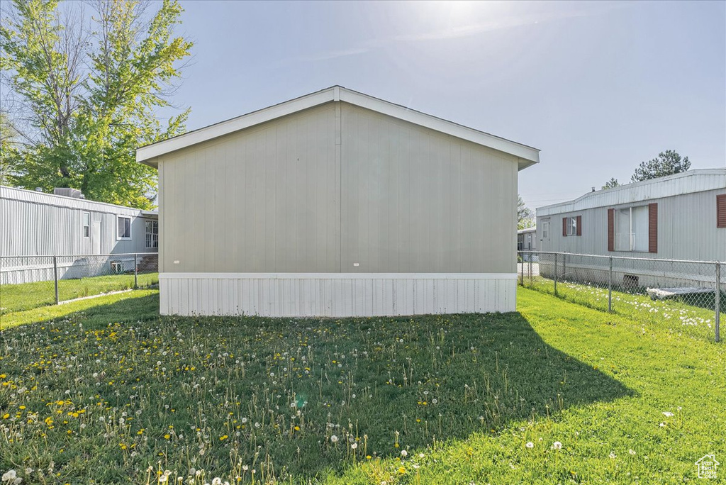 View of outdoor structure with fence