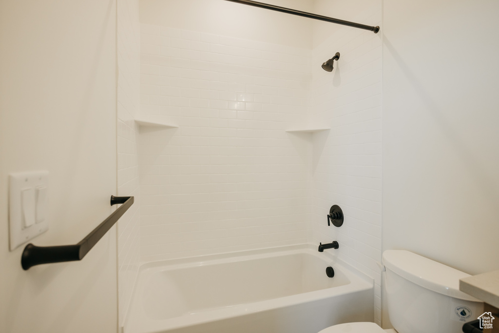 Bathroom with toilet and  shower combination