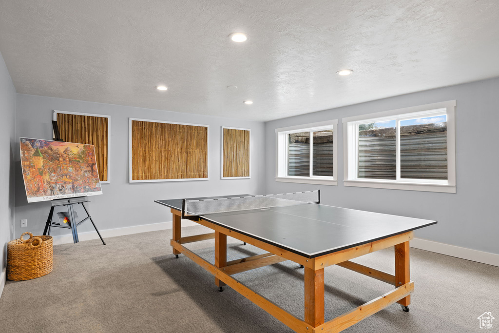 Playroom featuring recessed lighting, baseboards, carpet, and a textured ceiling