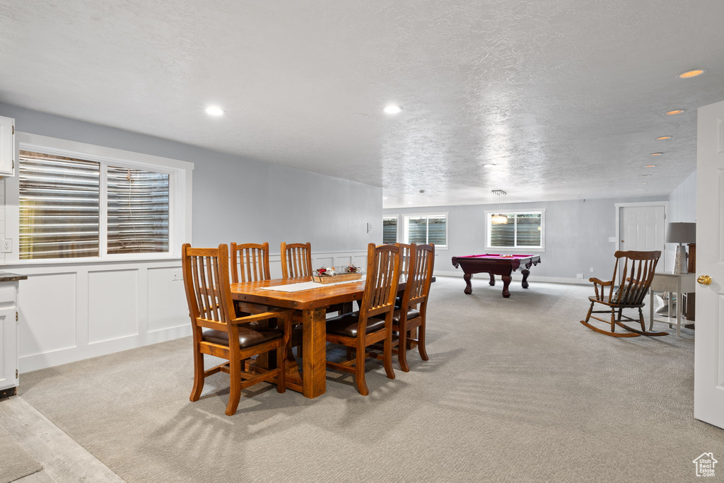 Dining room with recessed lighting, light colored carpet, and billiards