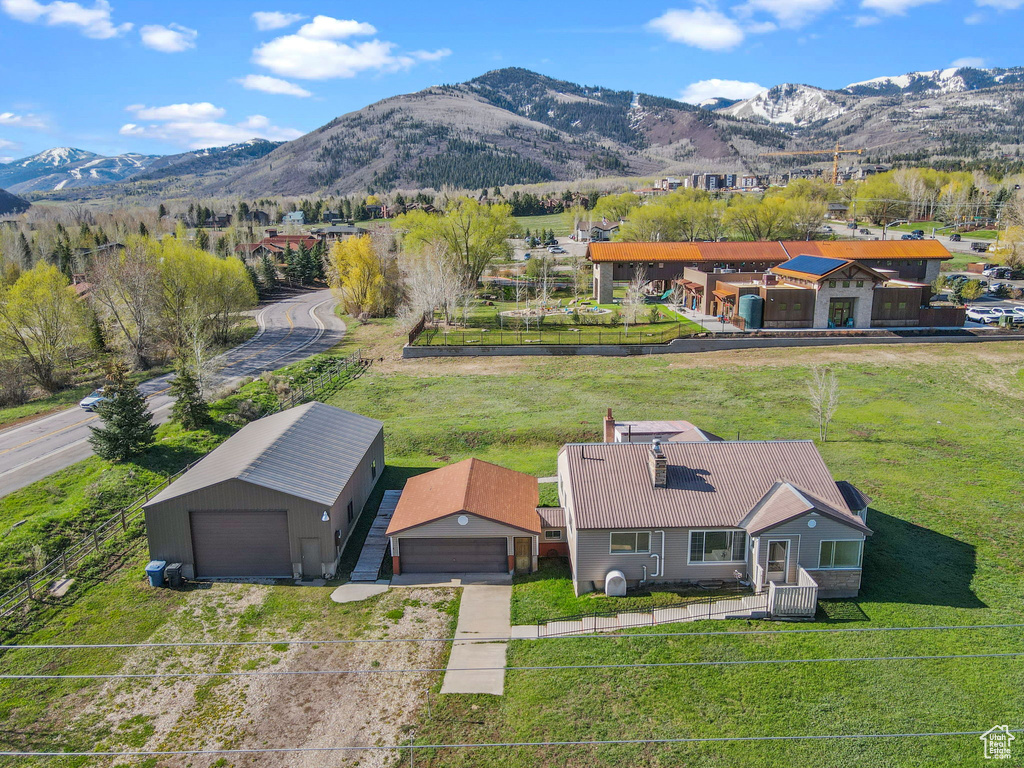 Birds eye view of property featuring a mountain view