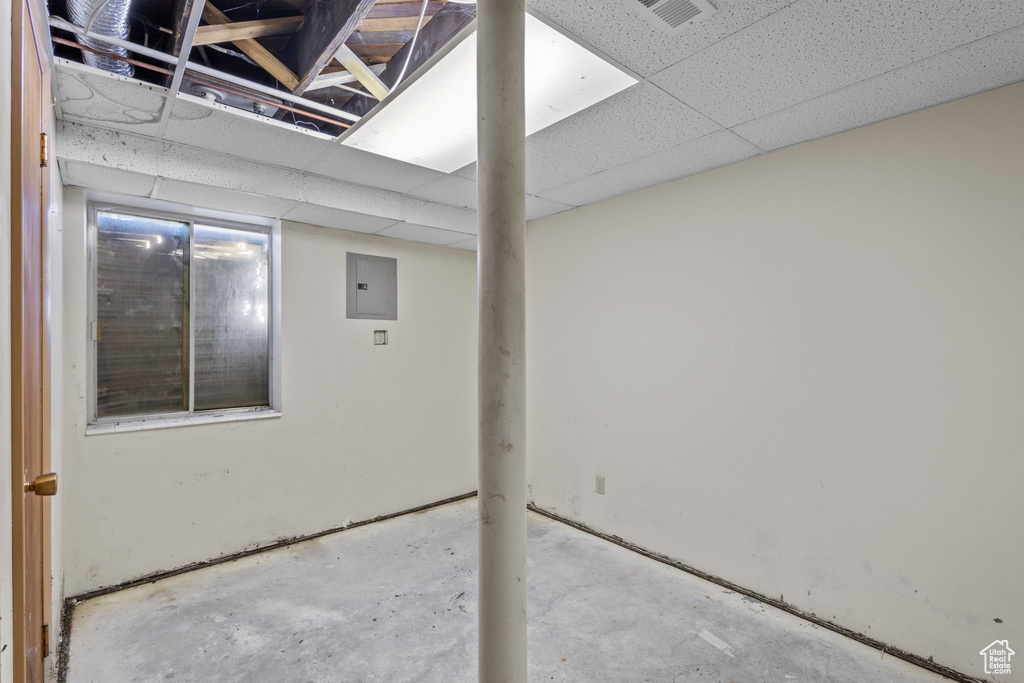 Below grade area featuring visible vents and electric panel